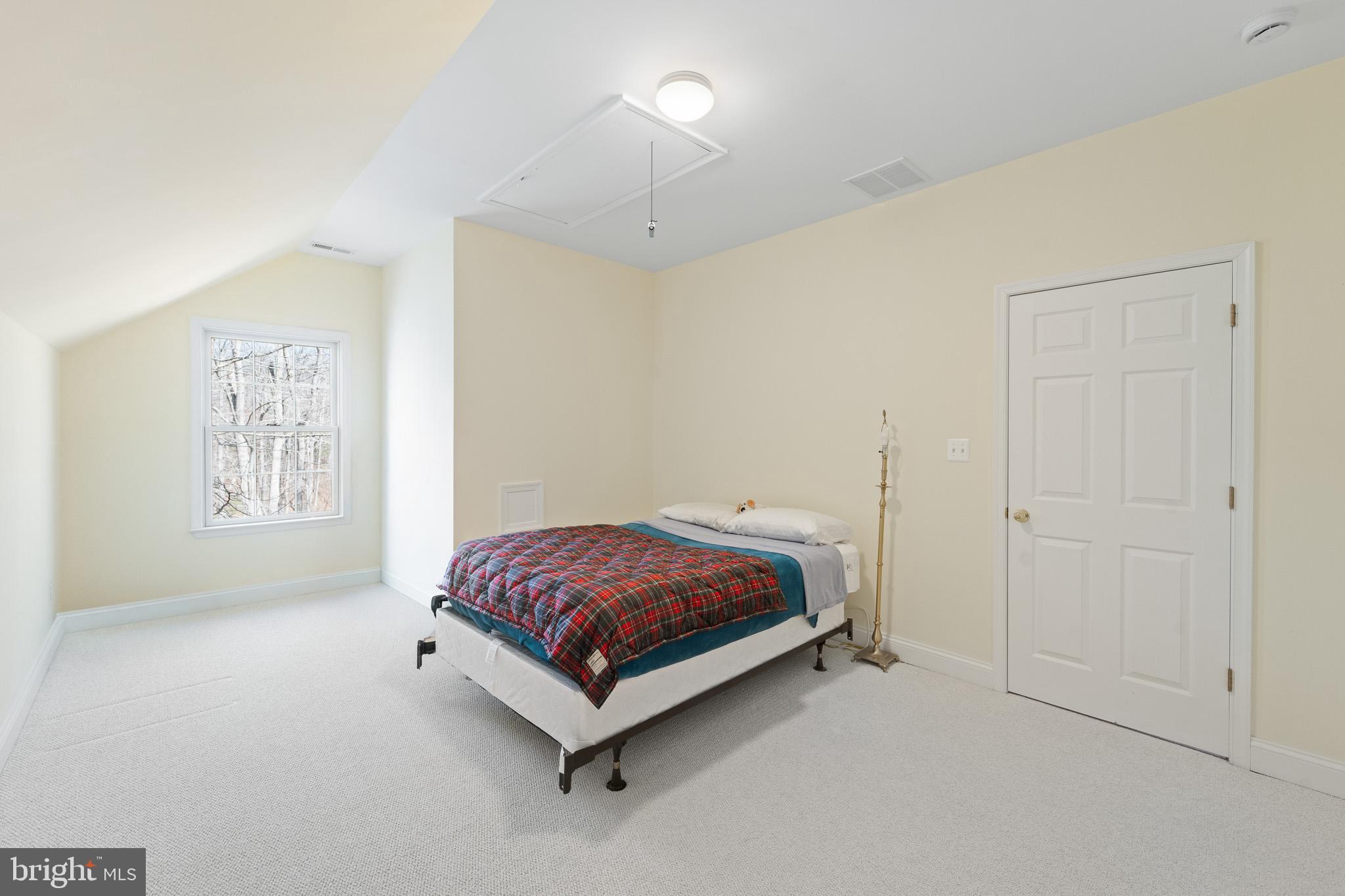 6380 Mallard Lane Lothian, MD 20711 - Photo 38 of 57 a bed room with a bed and a window