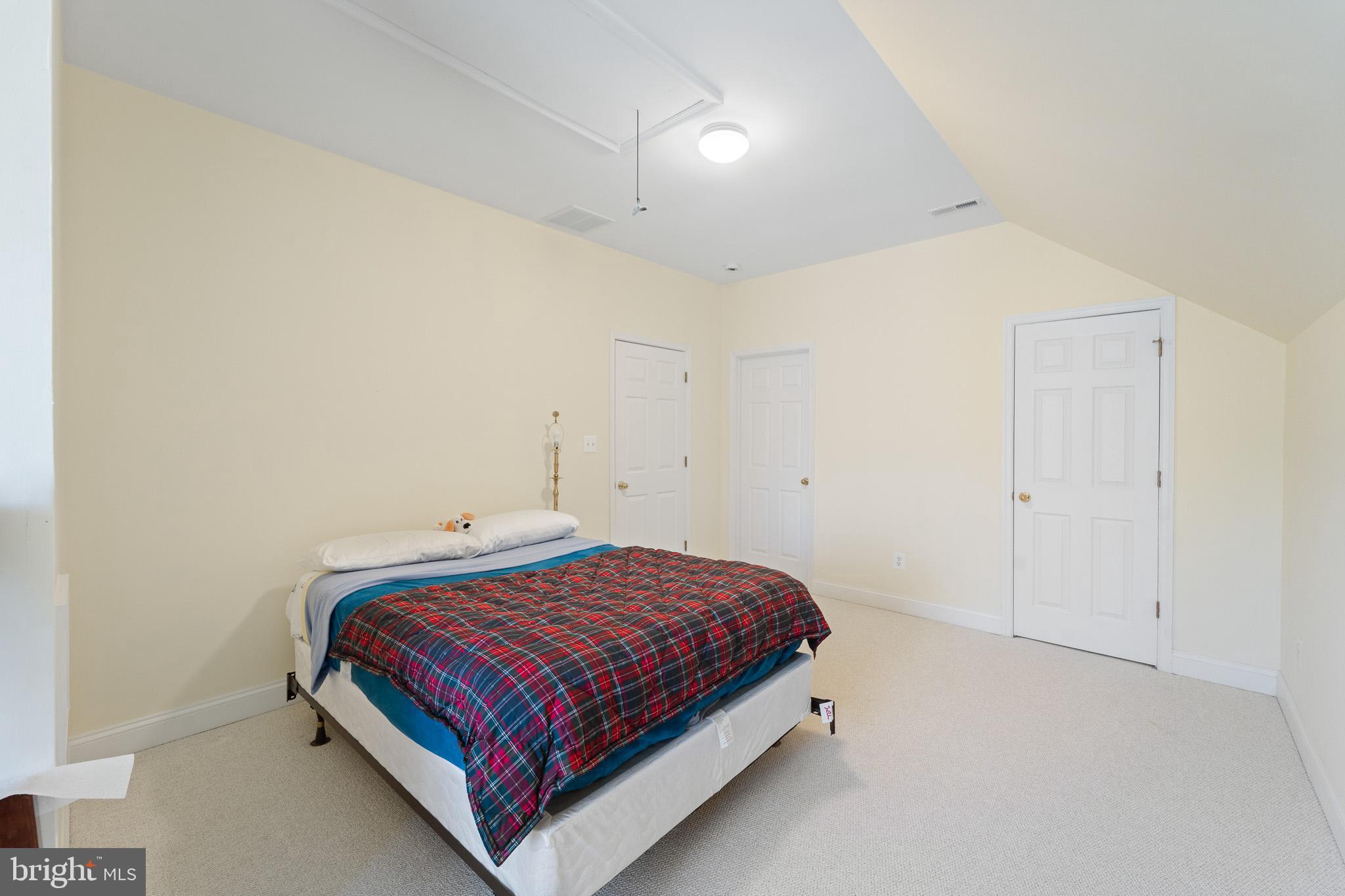 6380 Mallard Lane Lothian, MD 20711 - Photo 39 of 57 a bedroom with a bed and a night stand