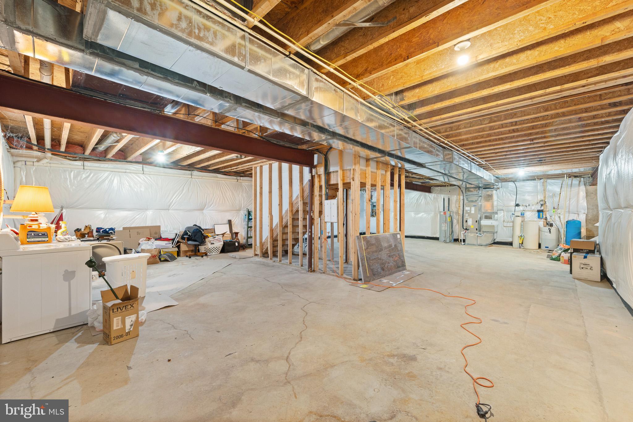 6380 Mallard Lane Lothian, MD 20711 - Photo 52 of 57 Unfinished basement with Culligan System