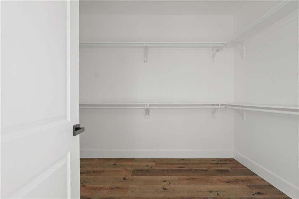 1116 East Oleander Street Fort Worth, TX 76104 - Photo 31 of 32 a view of an empty walk in closet