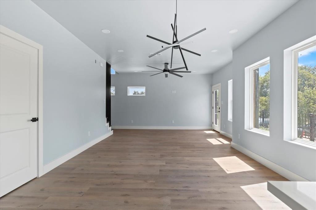 1116 East Oleander Street Fort Worth, TX 76104 - Photo 9 of 32 a view of an empty room with a window