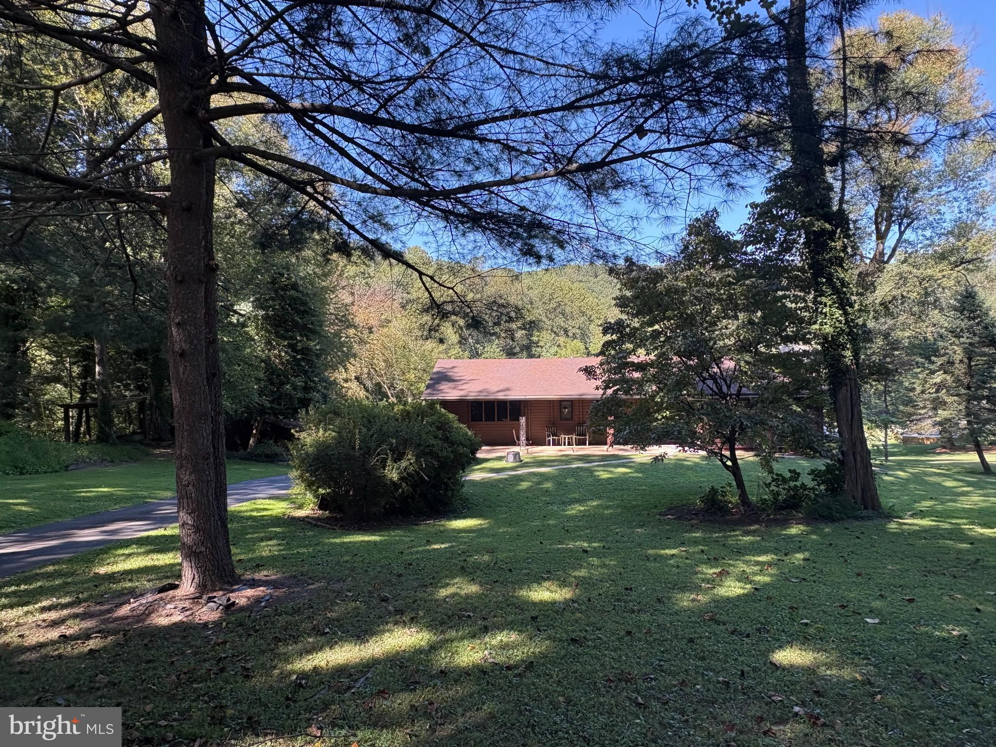 1131 Pennsy Road Pequea, PA 17565 - Photo 2 of 43 a view of a backyard with large trees