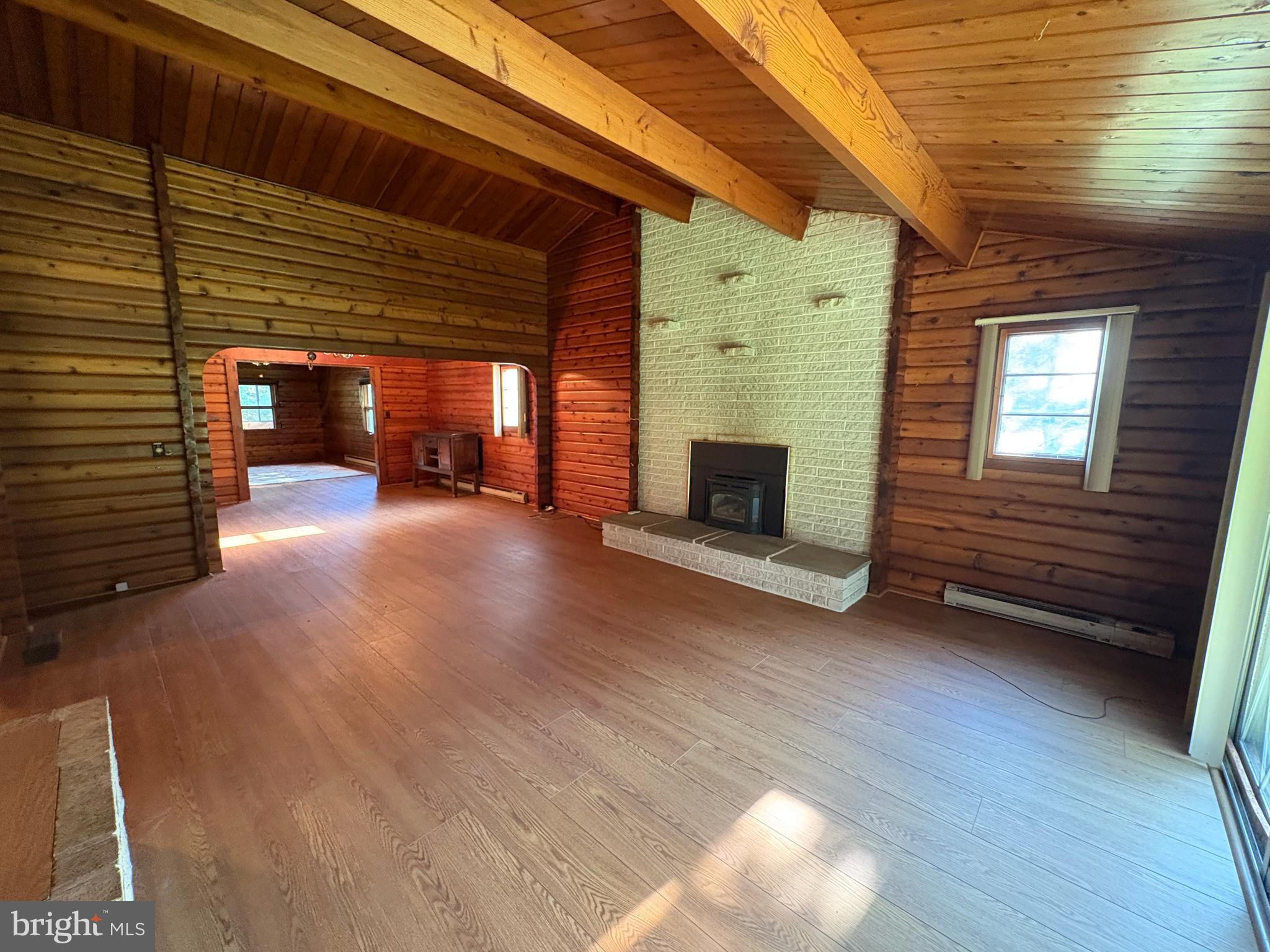 1131 Pennsy Road Pequea, PA 17565 - Photo 21 of 43 a view of a livingroom with wooden floor and a fireplace