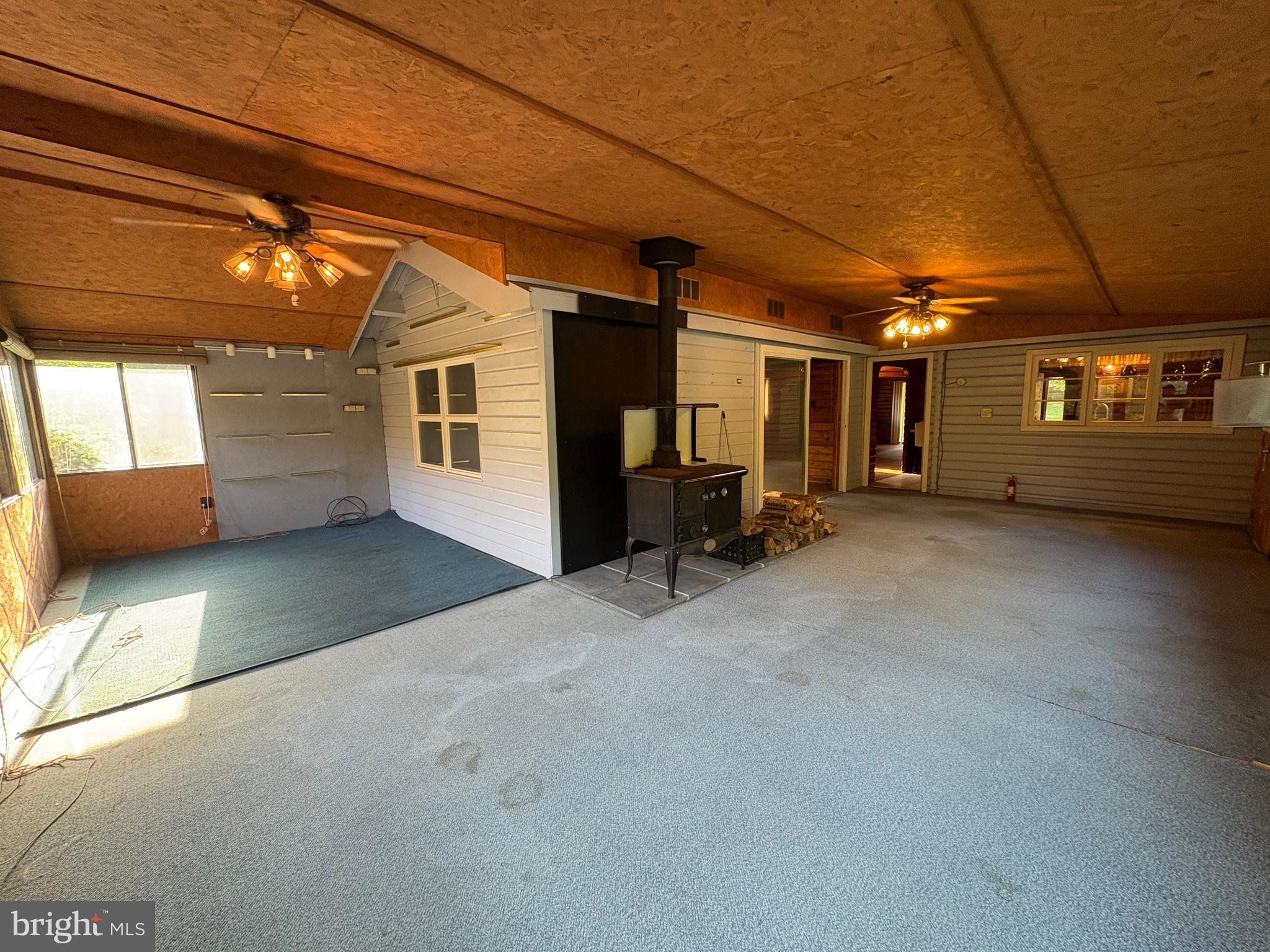1131 Pennsy Road Pequea, PA 17565 - Photo 29 of 43 a view of a livingroom with furniture a ceiling fan and window