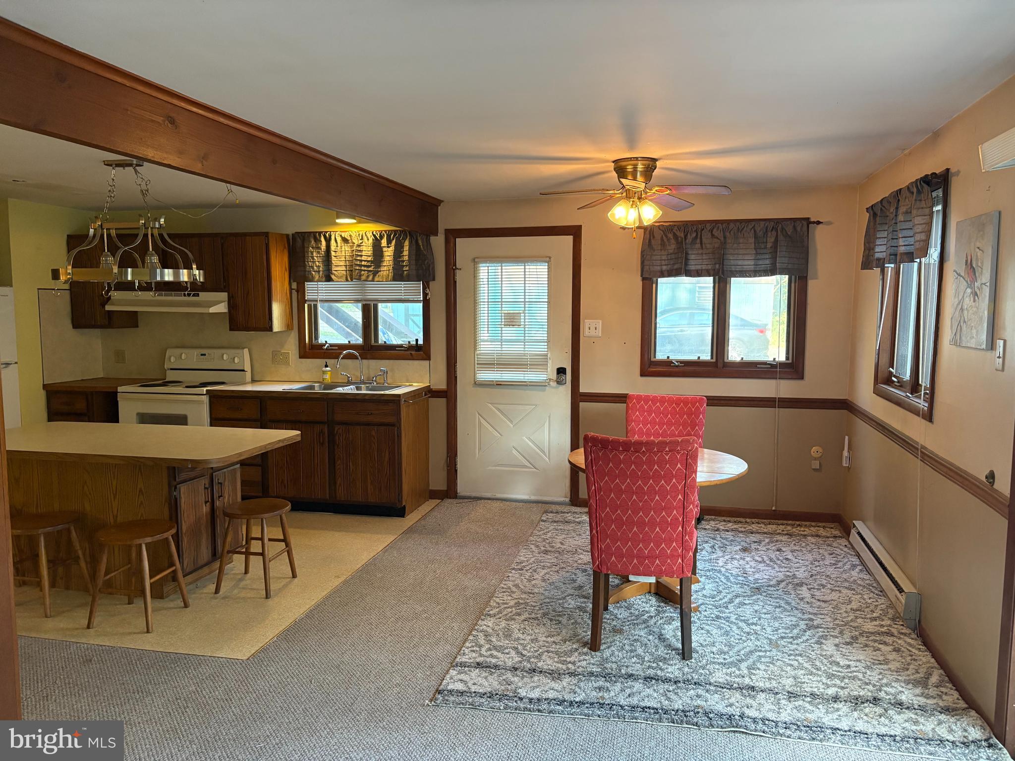 1131 Pennsy Road Pequea, PA 17565 - Photo 38 of 43 a kitchen with stainless steel appliances granite countertop a stove a sink and a refrigerator