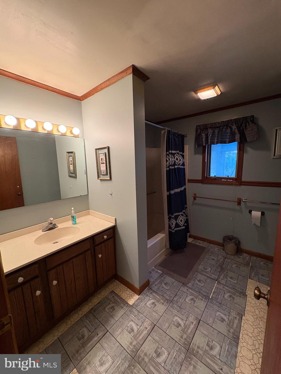 1131 Pennsy Road Pequea, PA 17565 - Photo 43 of 43 a bathroom with a double vanity sink and mirror