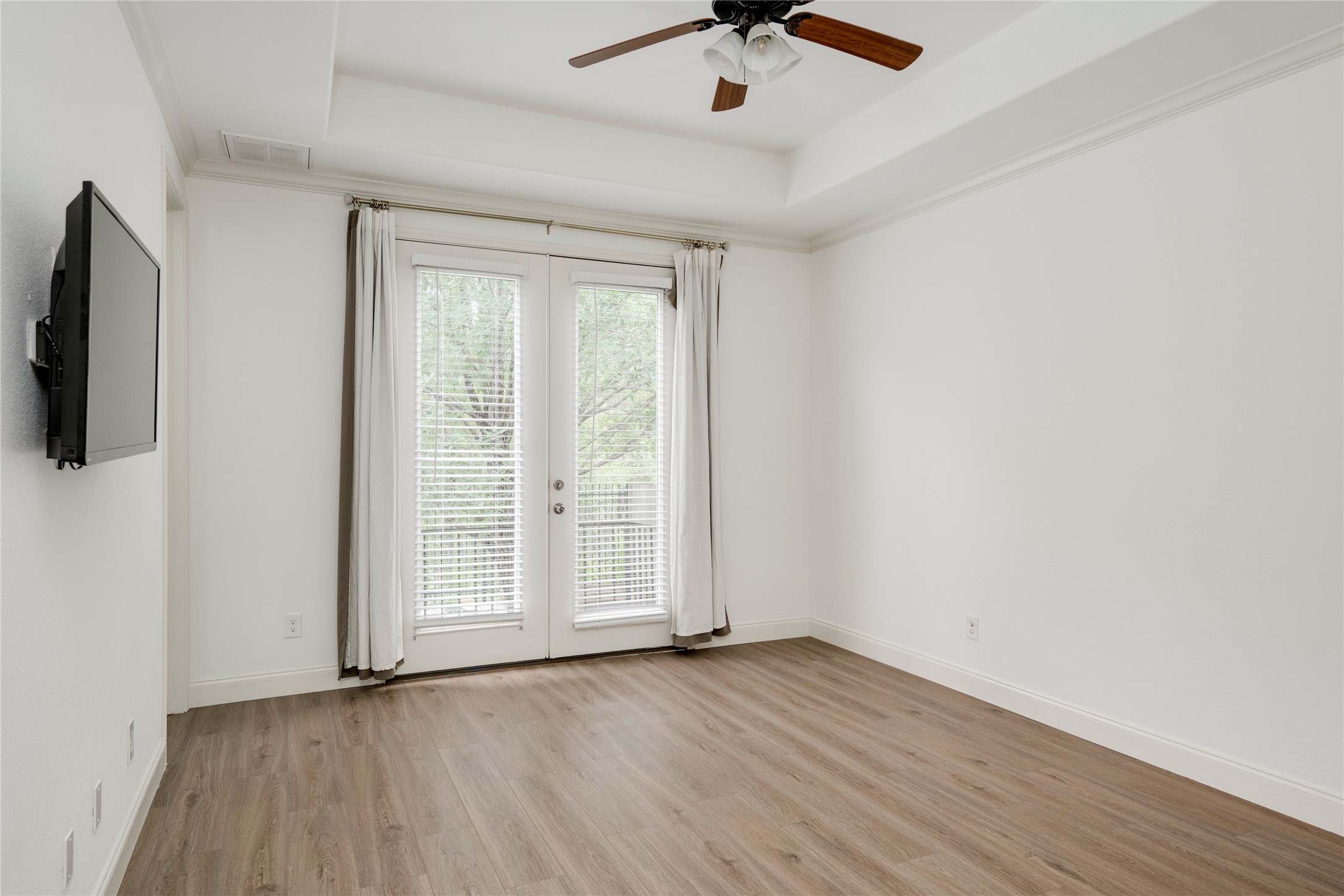 6008 Whipple Way Austin, TX 78745 - Photo 21 of 39 French doors provide natural light and access to the outdoors in this generous room.