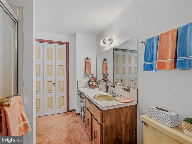 a workspace with furniture hardwood and a bedroom