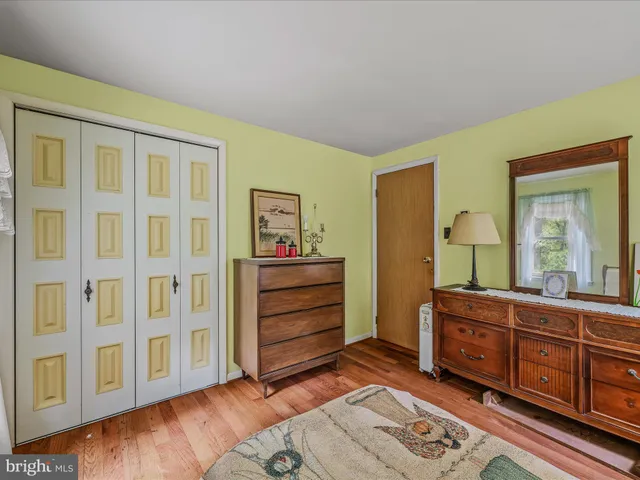 a room with pool table and furniture