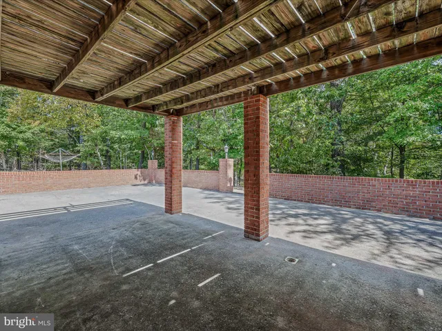 a view of a backyard with potted plants