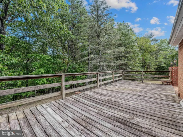 a view of a field with an outdoor space