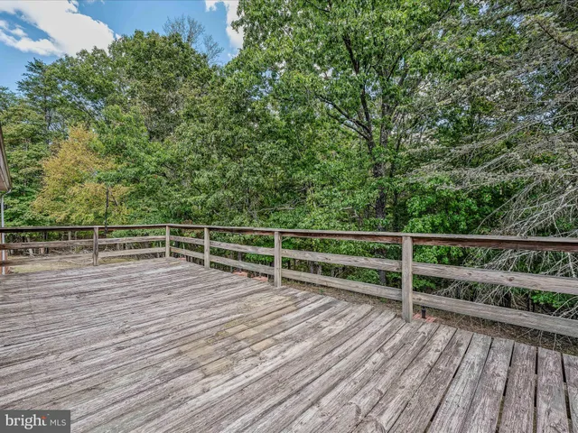 a view of a field with an ocean view
