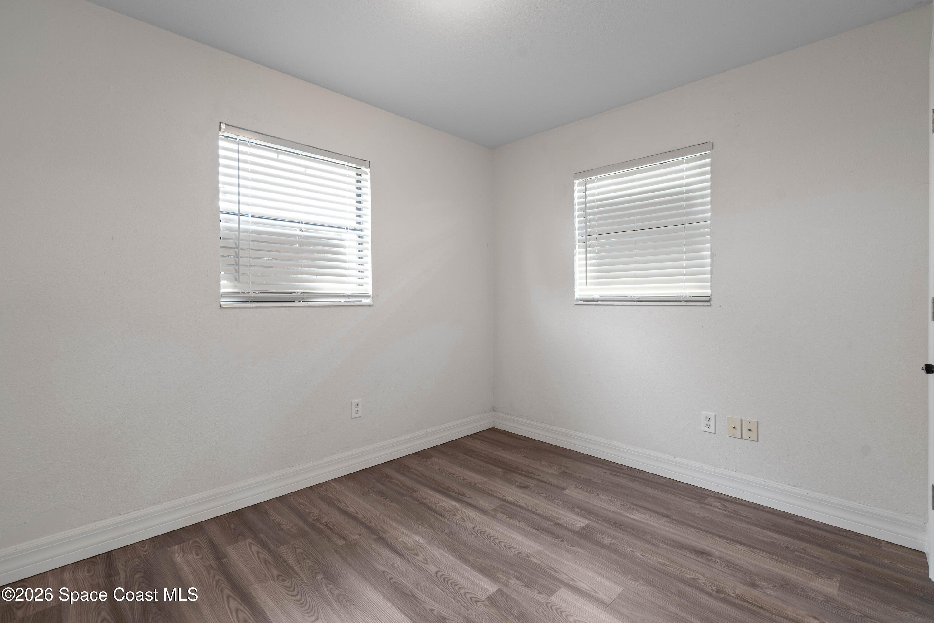 4037 Edwards Street Melbourne, FL 32901 - Photo 12 of 20 an empty room with a window
