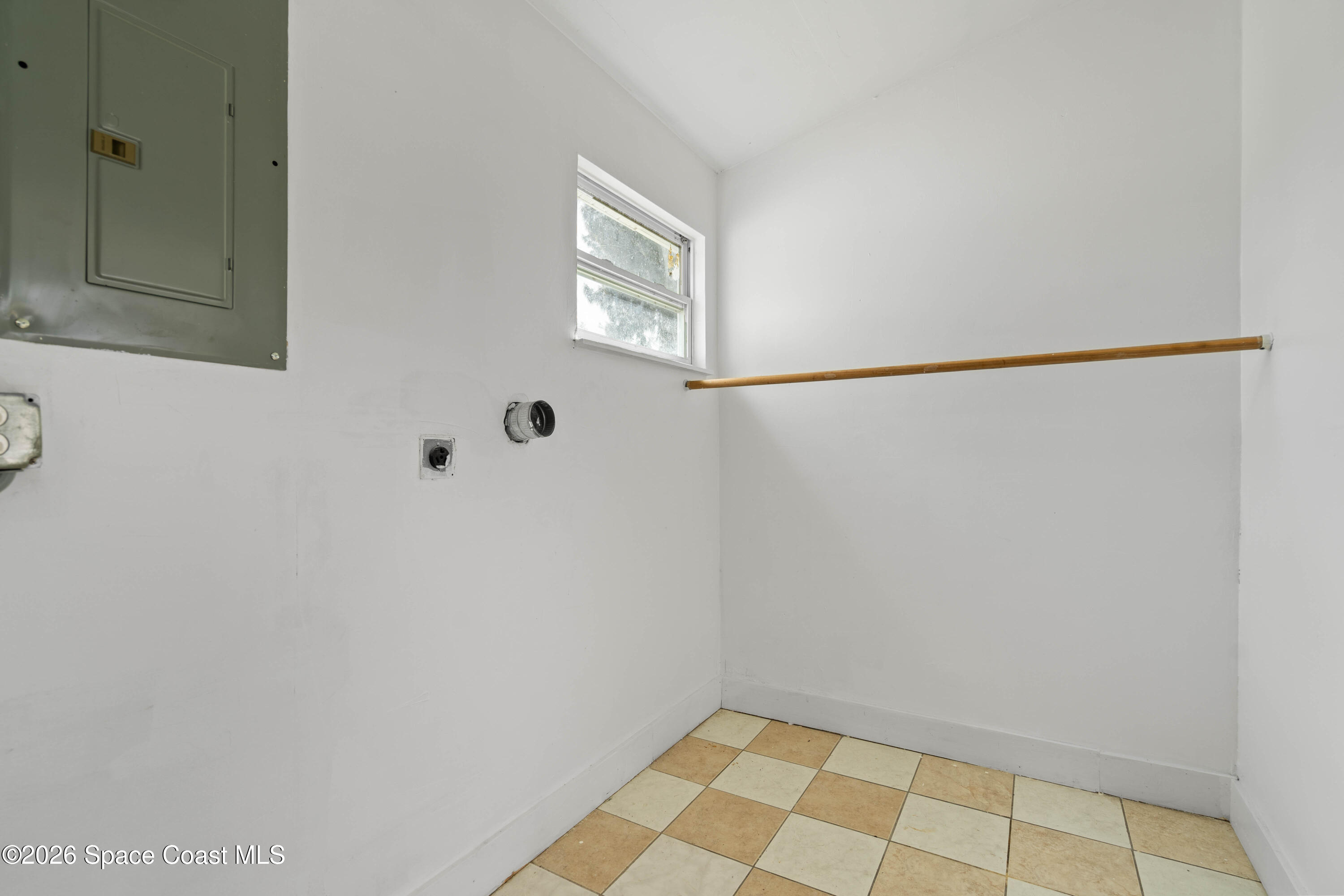 4037 Edwards Street Melbourne, FL 32901 - Photo 17 of 20 a view of a small space with wooden floor and a window