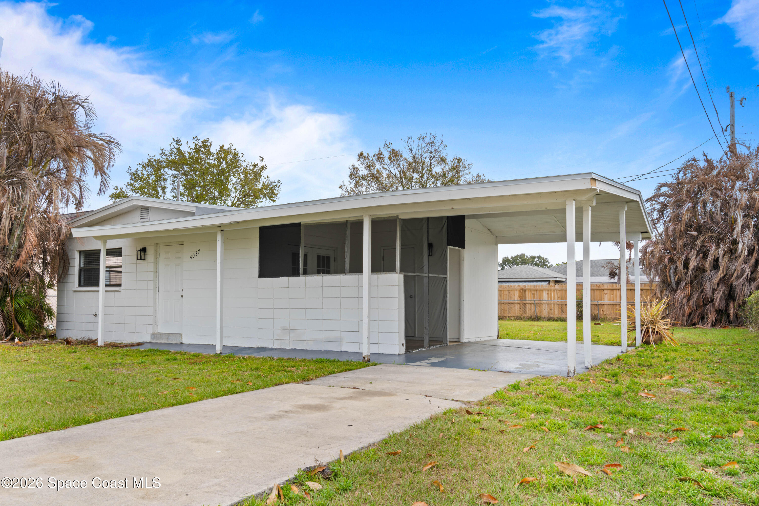 4037 Edwards Street Melbourne, FL 32901 - Photo 3 of 20 a view of a house with a backyard