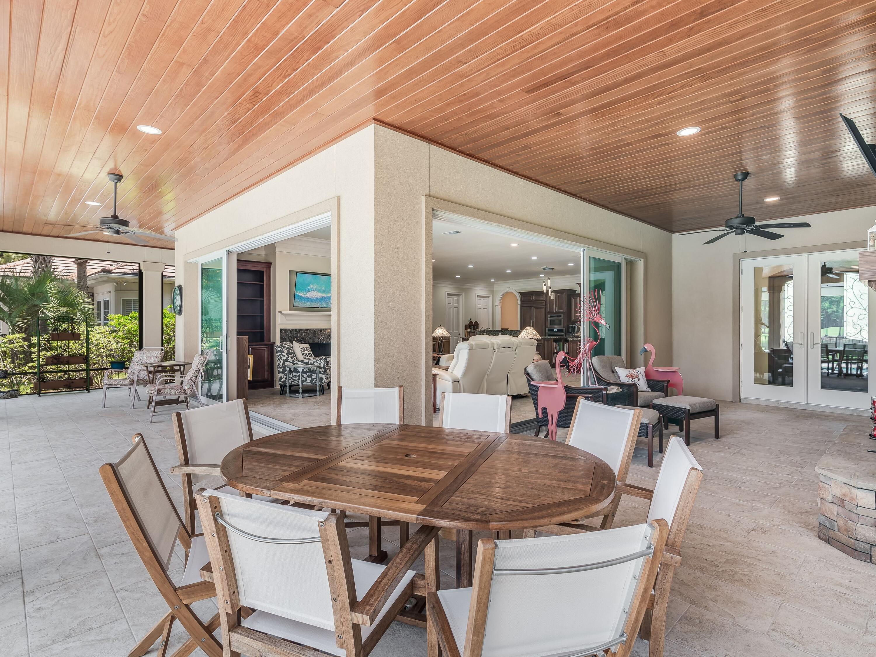 2916 Pine Valley Drive Sandestin, FL 32550 - Photo 13 of 48 a dining room with furniture and window
