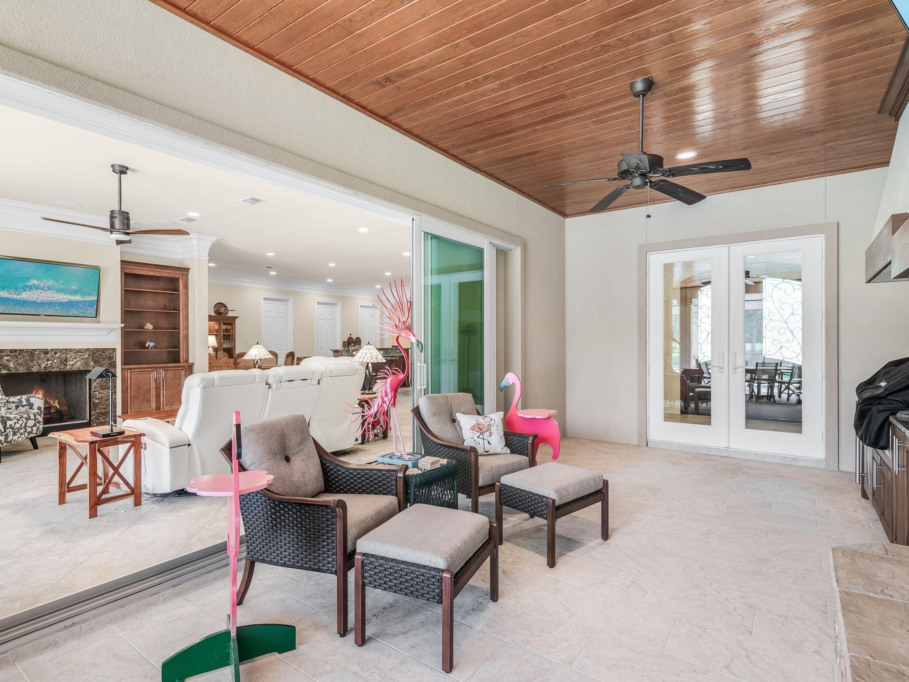 2916 Pine Valley Drive Sandestin, FL 32550 - Photo 14 of 48 a living room with furniture and a chandelier