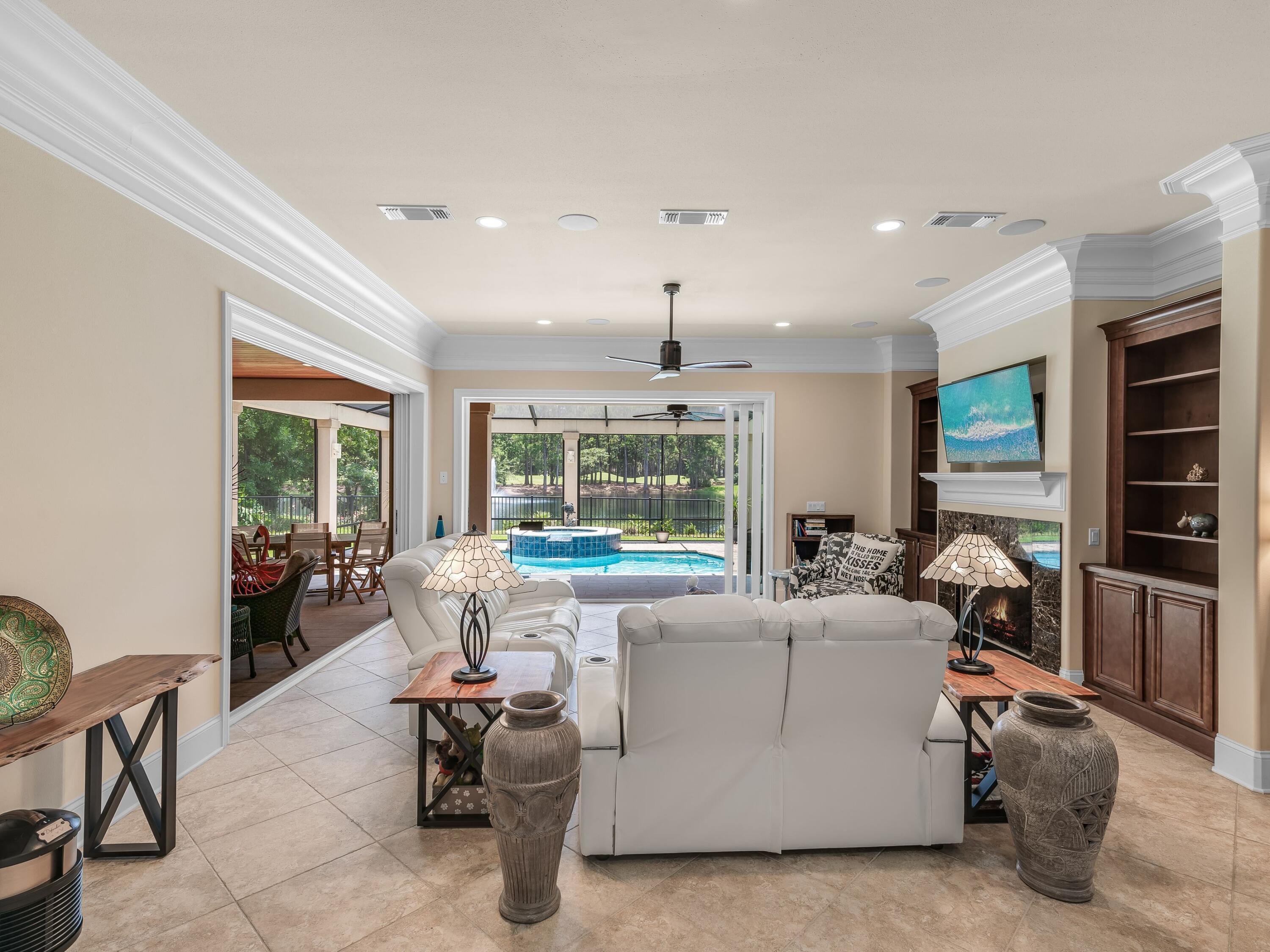 2916 Pine Valley Drive Sandestin, FL 32550 - Photo 15 of 48 a living room with furniture and a large window