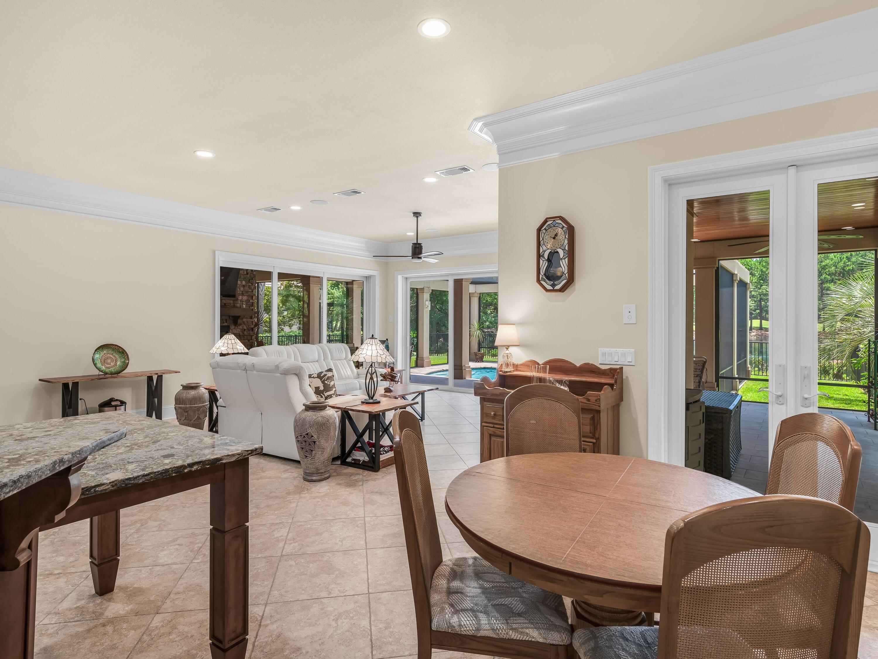 2916 Pine Valley Drive Sandestin, FL 32550 - Photo 19 of 48 a view of a dining room with furniture