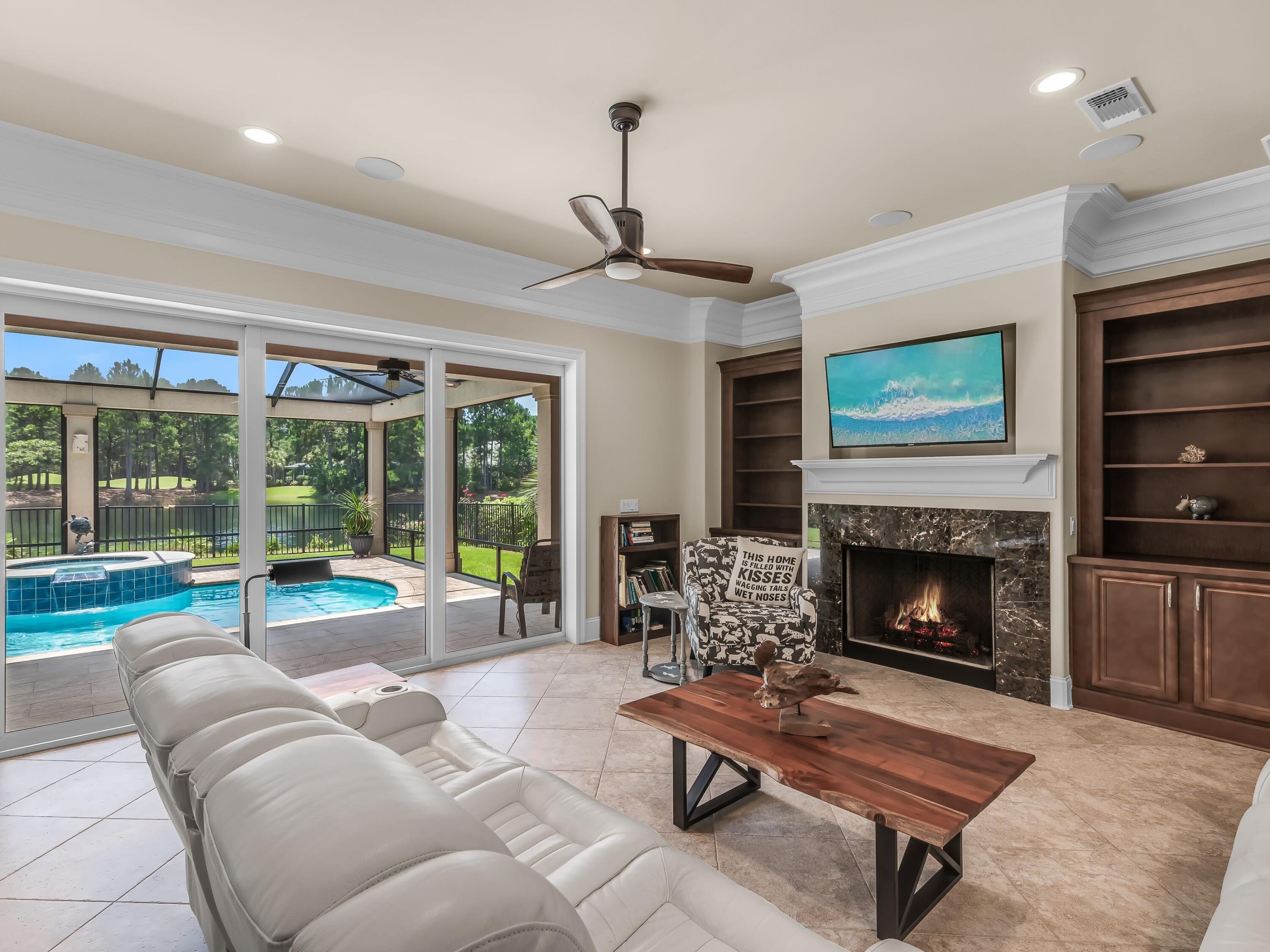 2916 Pine Valley Drive Sandestin, FL 32550 - Photo 23 of 48 a living room with furniture and a fireplace