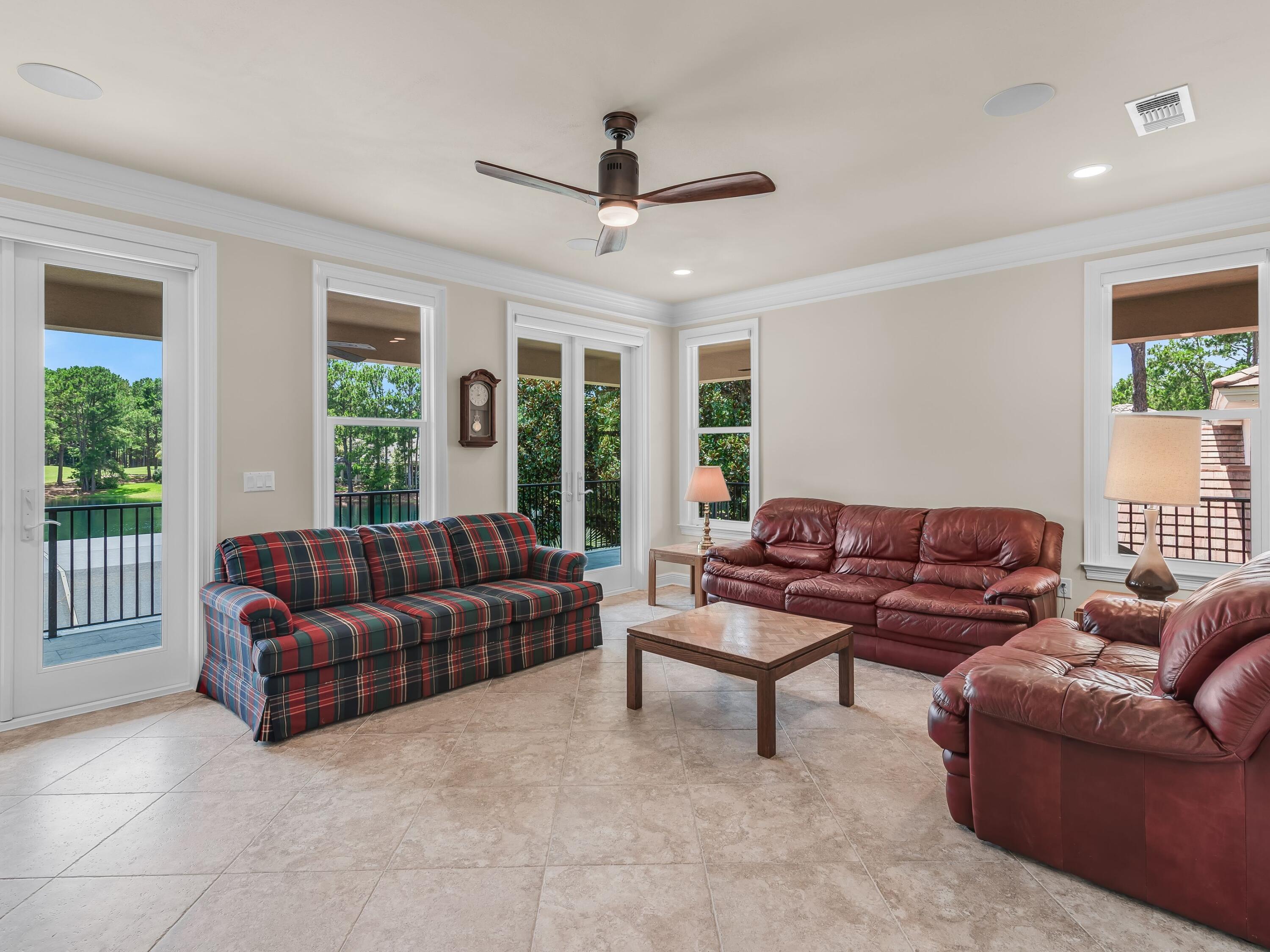 2916 Pine Valley Drive Sandestin, FL 32550 - Photo 32 of 48 a living room with furniture and a large window