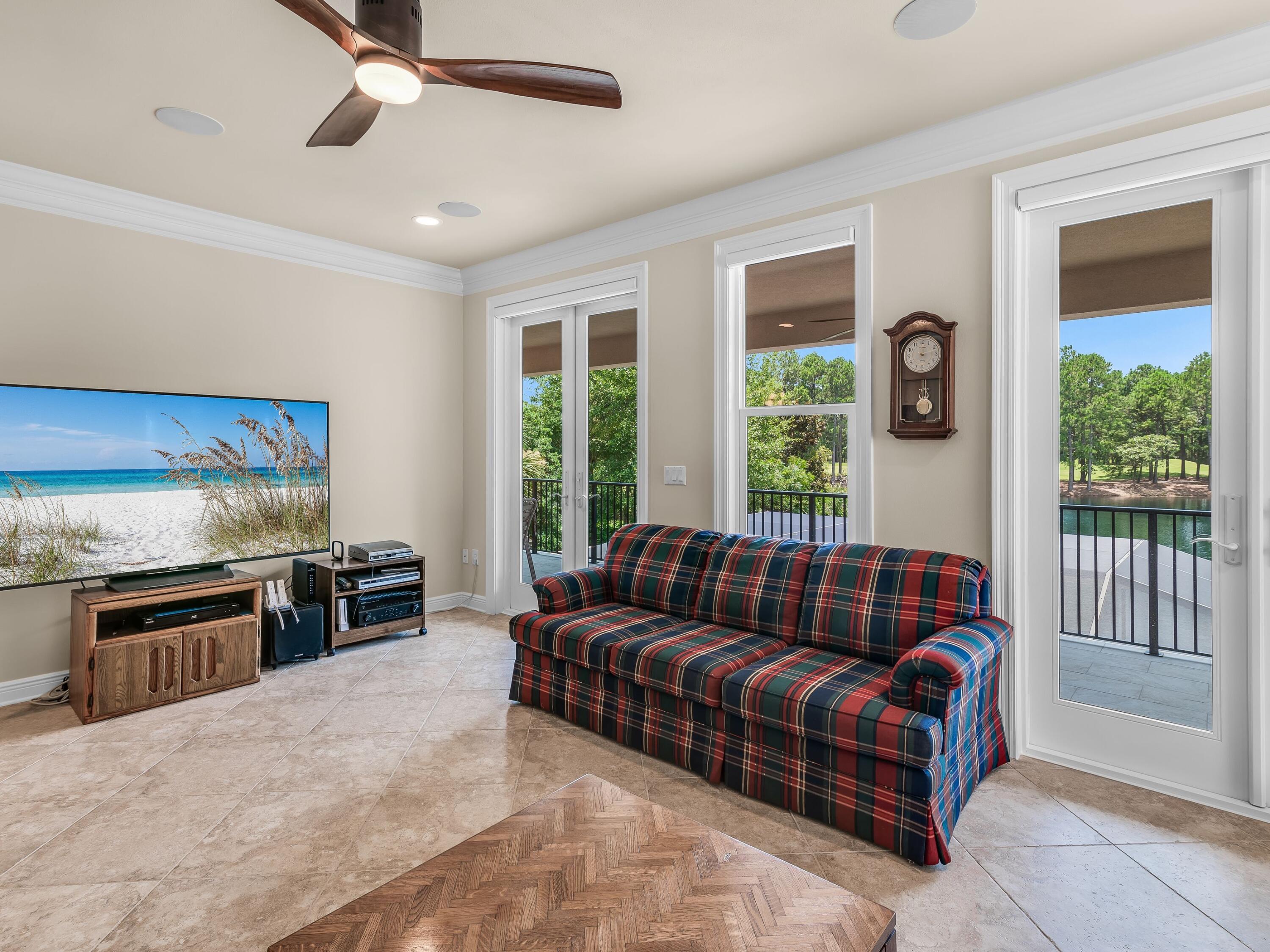 2916 Pine Valley Drive Sandestin, FL 32550 - Photo 33 of 48 a living room with furniture and a fireplace