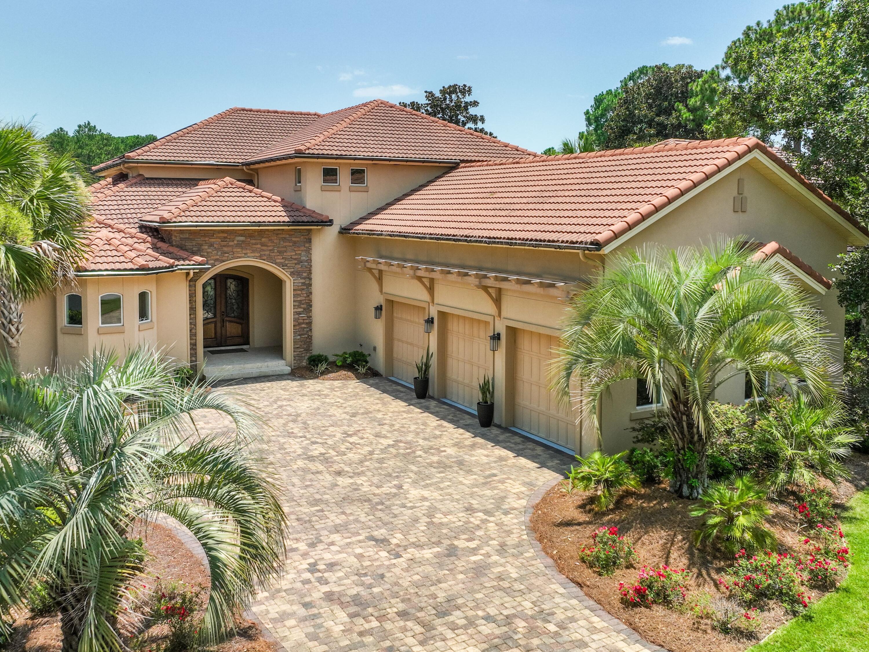2916 Pine Valley Drive Sandestin, FL 32550 - Photo 44 of 48 a front view of a house with garden
