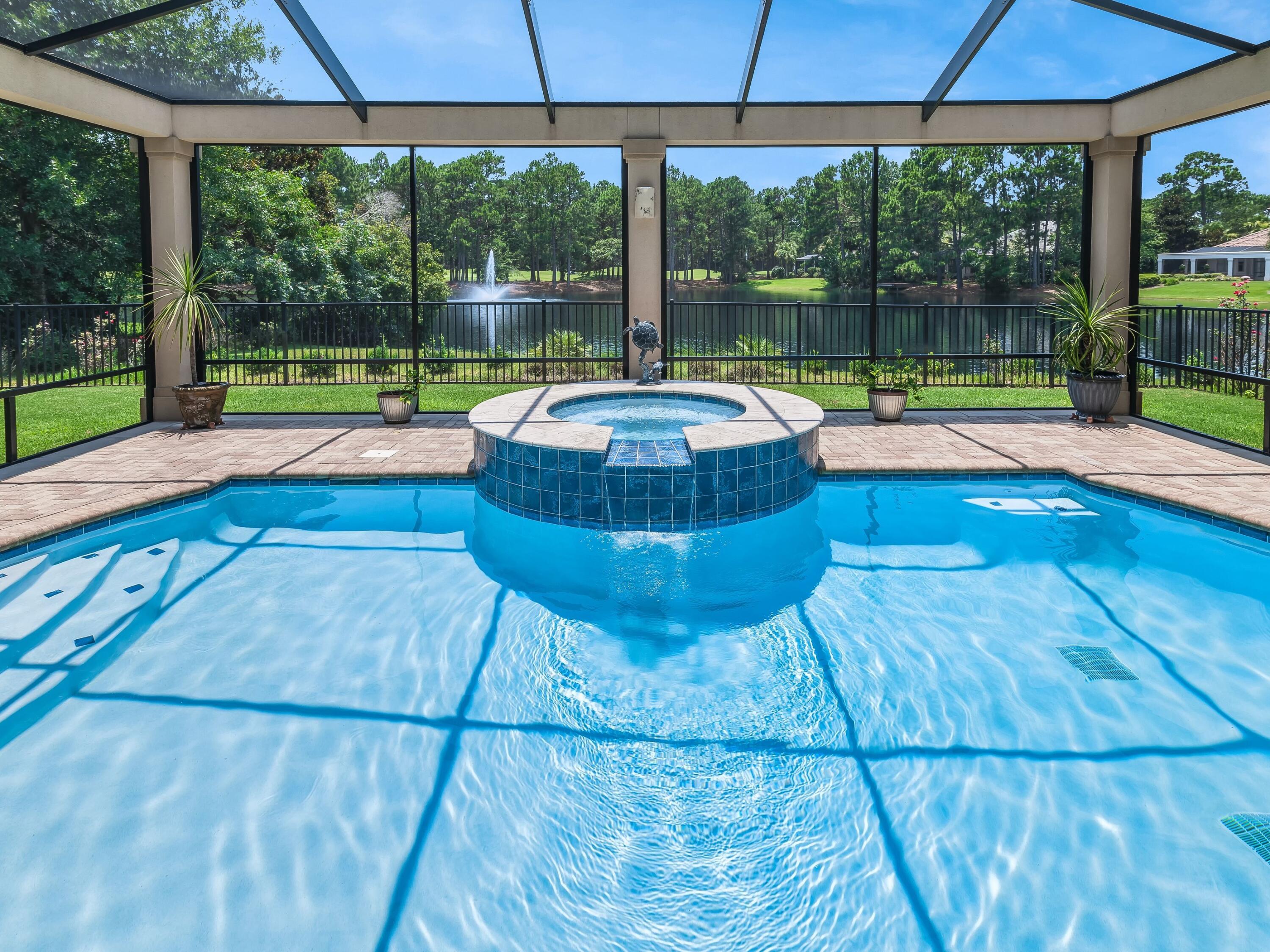 2916 Pine Valley Drive Sandestin, FL 32550 - Photo 6 of 48 a view of a swimming pool with a porch