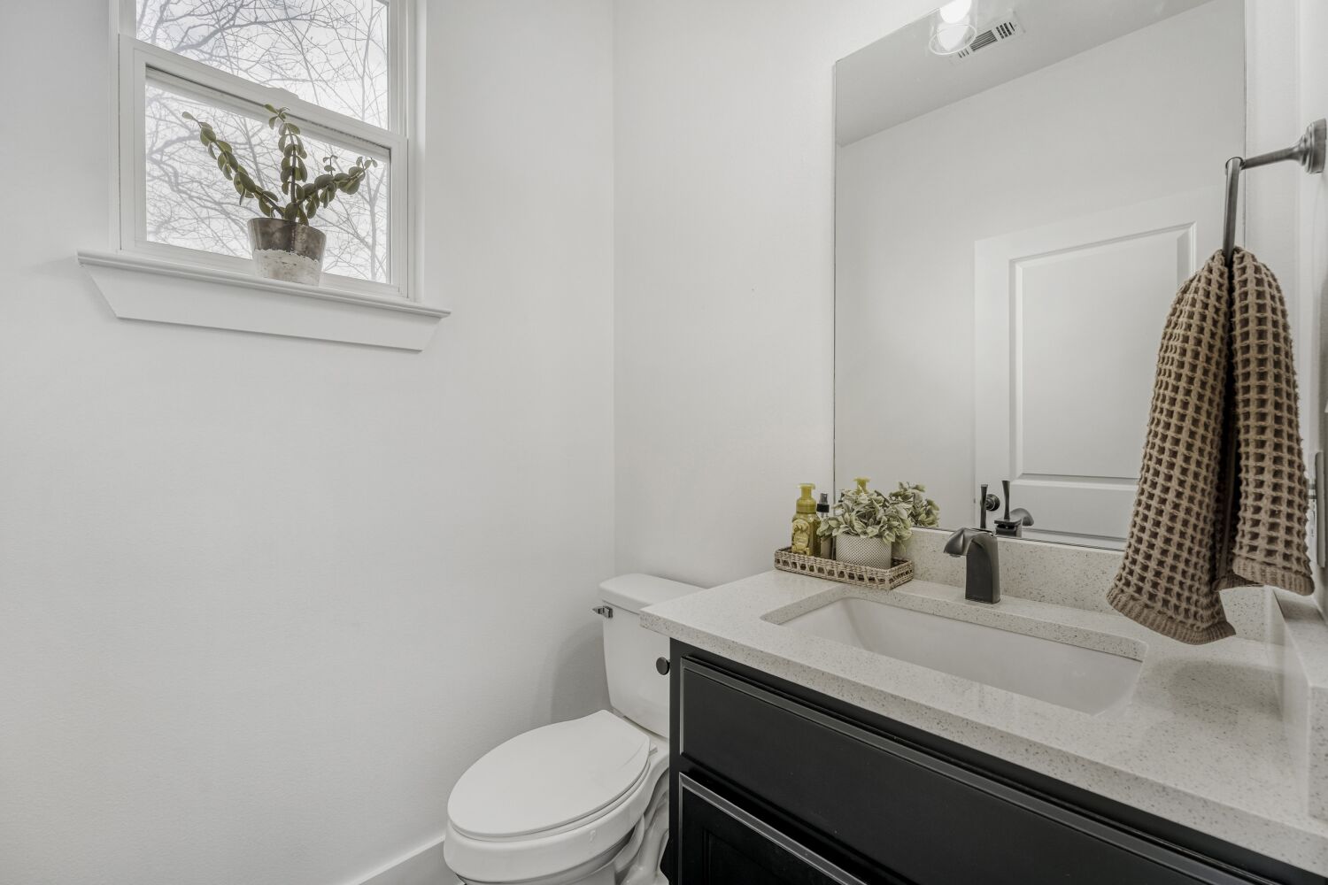 125 Irene Street Elgin, TX 78621 - Photo 12 of 24 Bathroom featuring vanity and toilet
