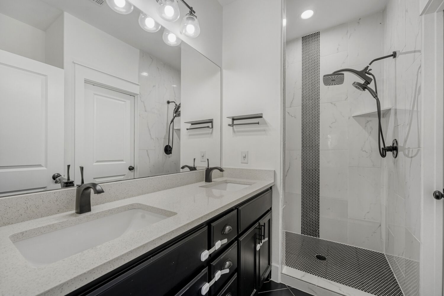 125 Irene Street Elgin, TX 78621 - Photo 15 of 24 Full bath featuring double vanity, a shower stall, and recessed lighting