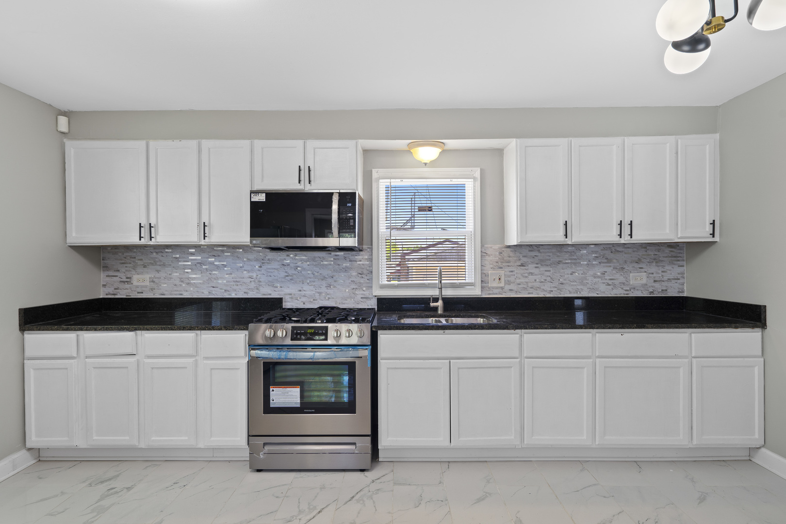 11442 South Aberdeen Street Chicago, IL 60643 - Photo 11 of 19 a kitchen with stainless steel appliances granite countertop white cabinets and a stove a sink