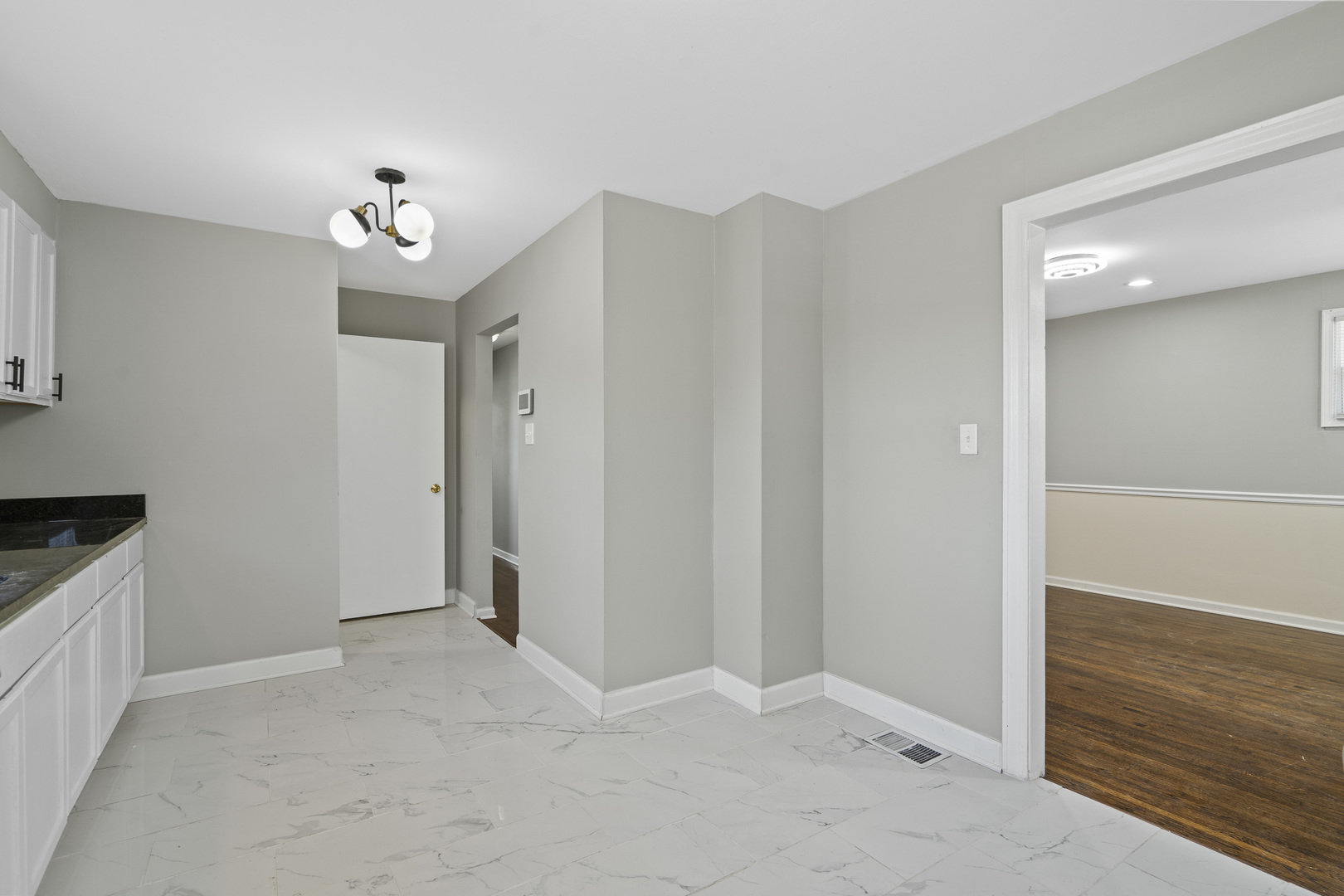 11442 South Aberdeen Street Chicago, IL 60643 - Photo 12 of 19 wooden floor in an empty room with a window