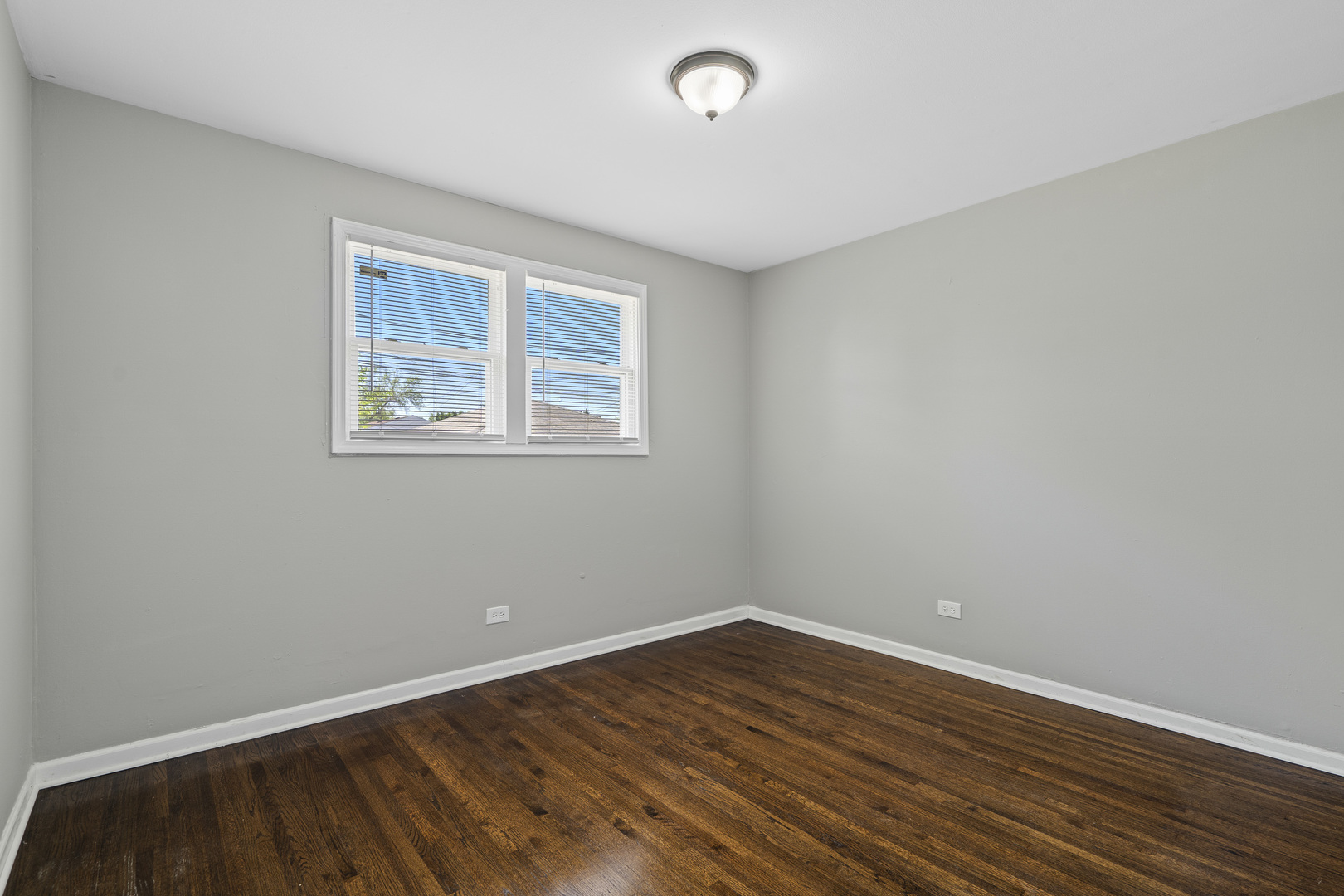 11442 South Aberdeen Street Chicago, IL 60643 - Photo 14 of 19 wooden floor in an empty room with a window