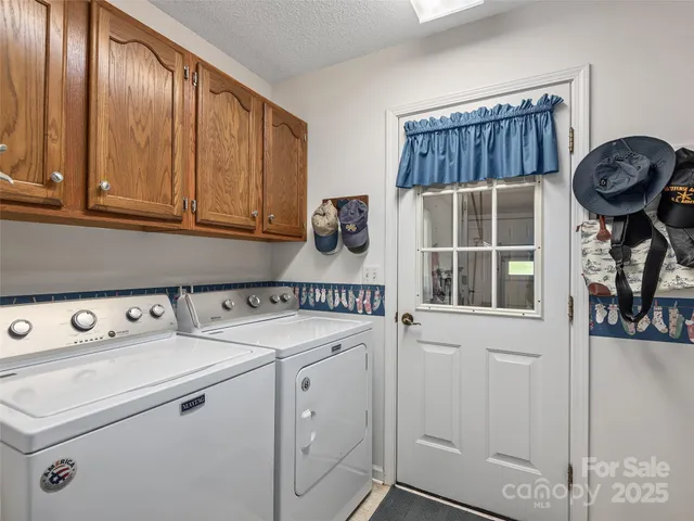 a kitchen with a cabinets and a stove top oven