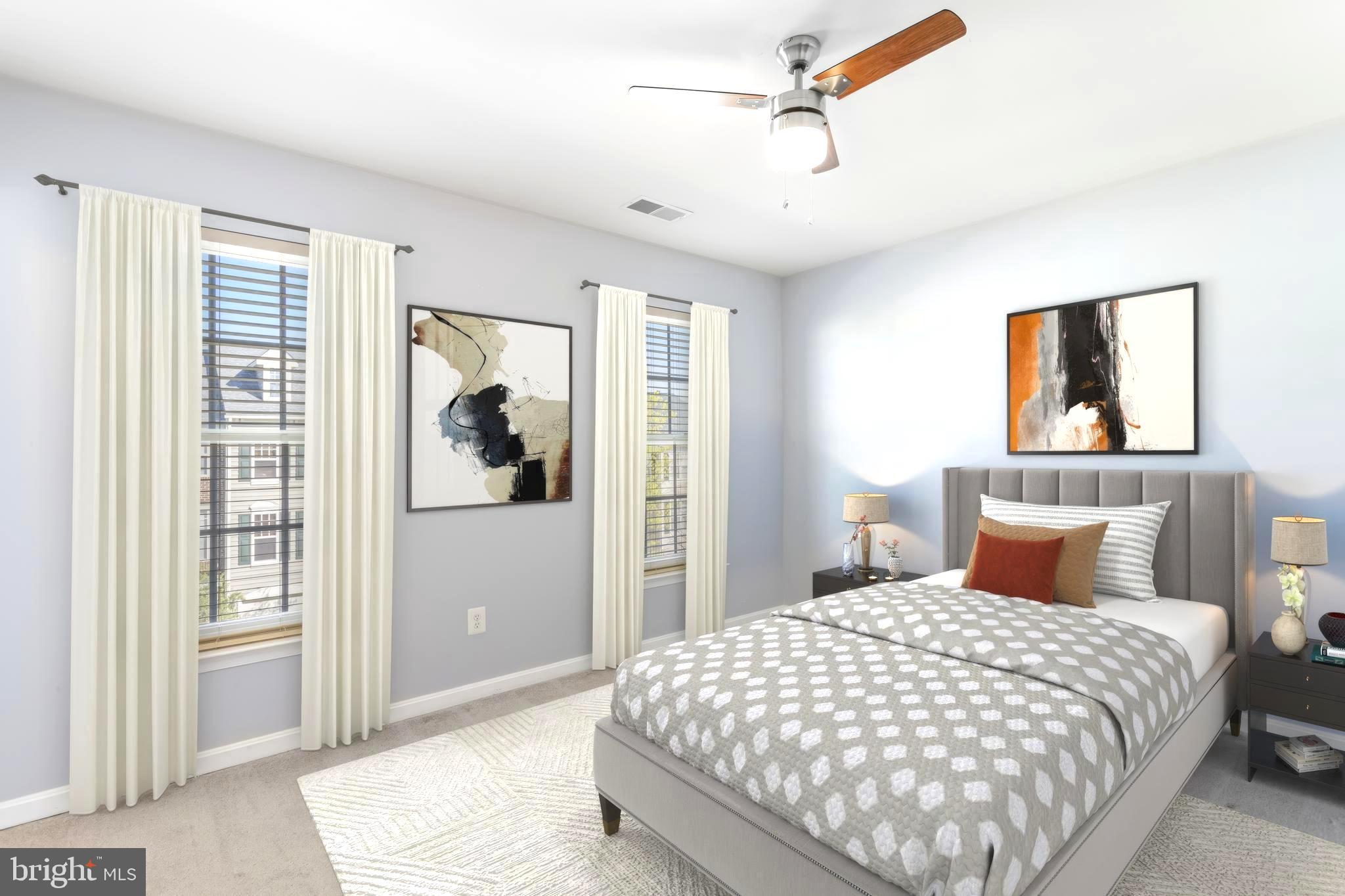 9152 Ribbon Falls Loop Bristow, VA 20136 - Photo 35 of 61 a bedroom with a large bed and a window