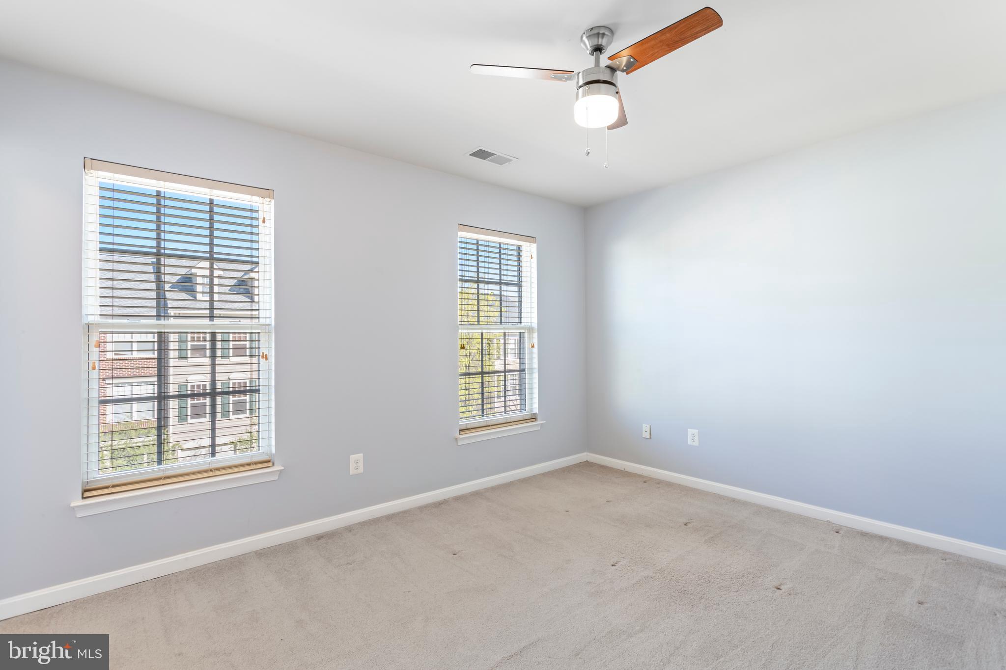 9152 Ribbon Falls Loop Bristow, VA 20136 - Photo 36 of 61 a view of an empty room with a window