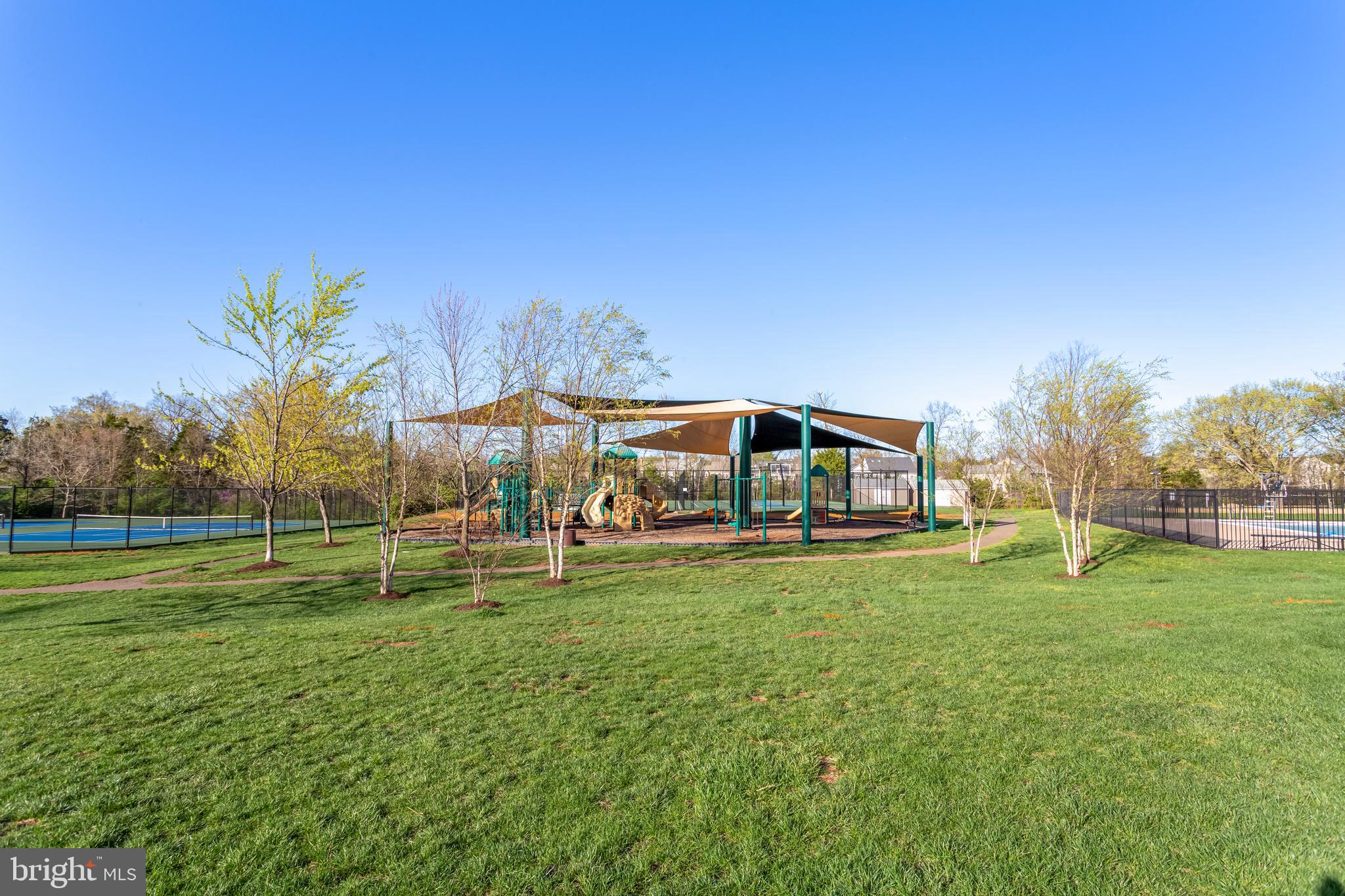 9152 Ribbon Falls Loop Bristow, VA 20136 - Photo 58 of 61 a view of a park with large trees