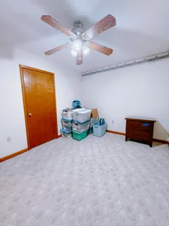 a view of an chairs in the balcony