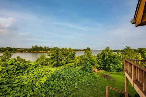 a view of a lake with a outdoor space