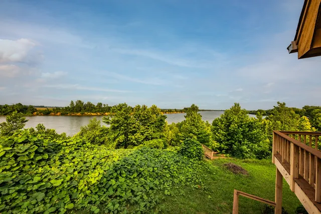 a view of a lake with a outdoor space