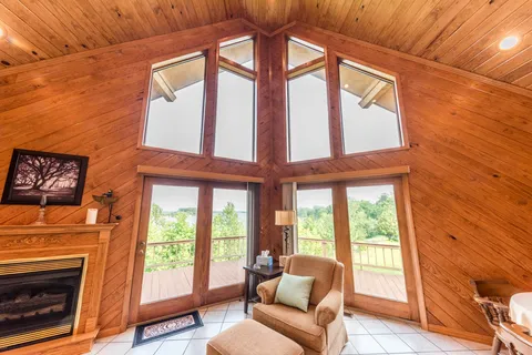 a kitchen with stainless steel appliances granite countertop a sink and a refrigerator
