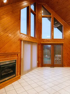 a kitchen with stainless steel appliances granite countertop a refrigerator a stove and a sink with granite countertops