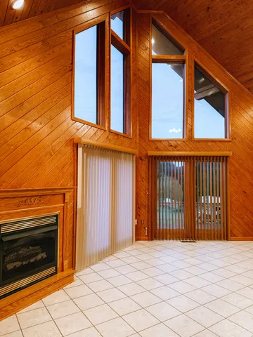 a kitchen with stainless steel appliances granite countertop a refrigerator a stove and a sink with granite countertops