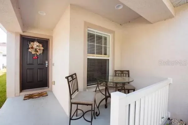 a room with furniture and a window