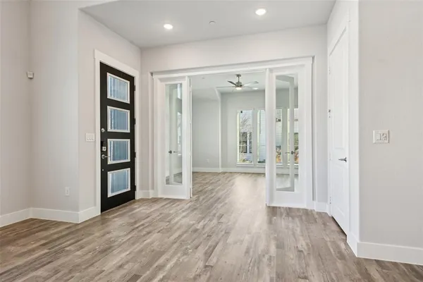 a kitchen with a sink a stove and cabinets