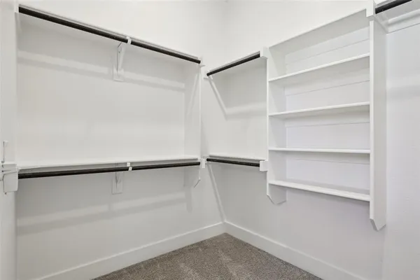 a bathroom with a sink and shower