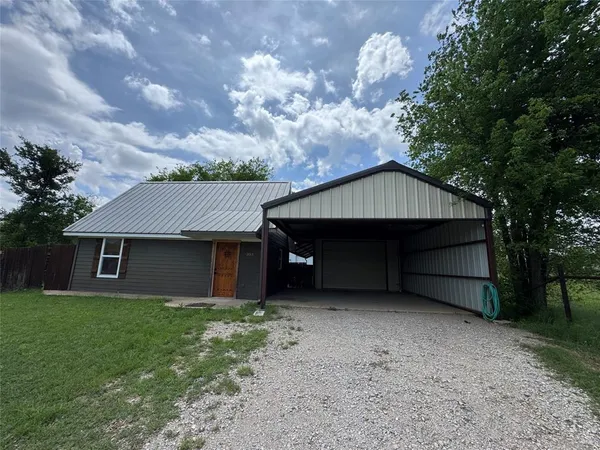 a view of a house with a patio