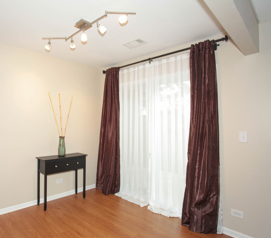 2335 Ridge Avenue Aurora, IL 60504 - Photo 4 of 20 a view of a room with a front door