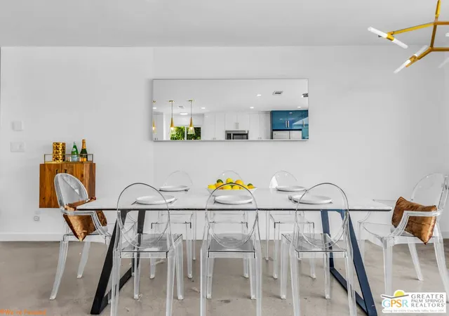 a room with furniture and a flat screen tv