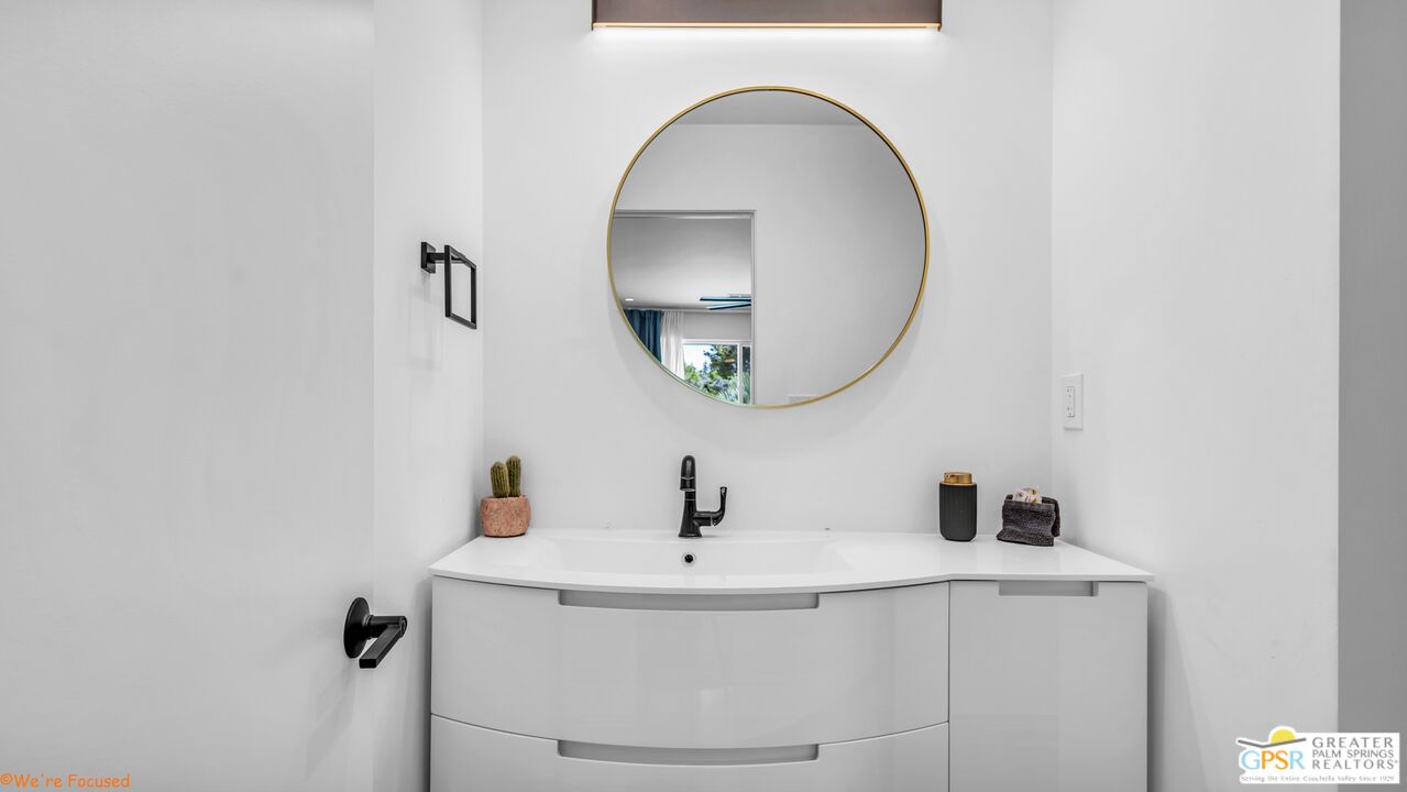 545 West Yorba Road Palm Springs, CA 92262 - Photo 21 of 72 a bathroom with a sink and a mirror